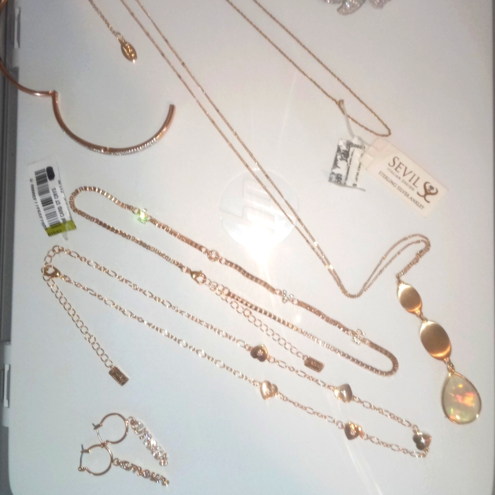 Sevile gold-sterling silver necklace, Jessica Simpson Amor earrings, bracelets,
